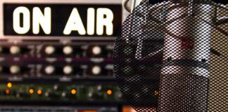 a microphone in front of a sound board