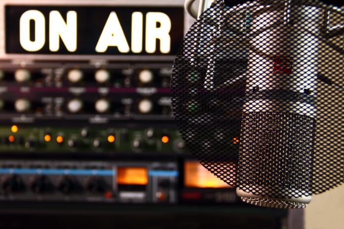 a microphone in front of a sound board