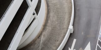 aerial photography of road with arrow signs