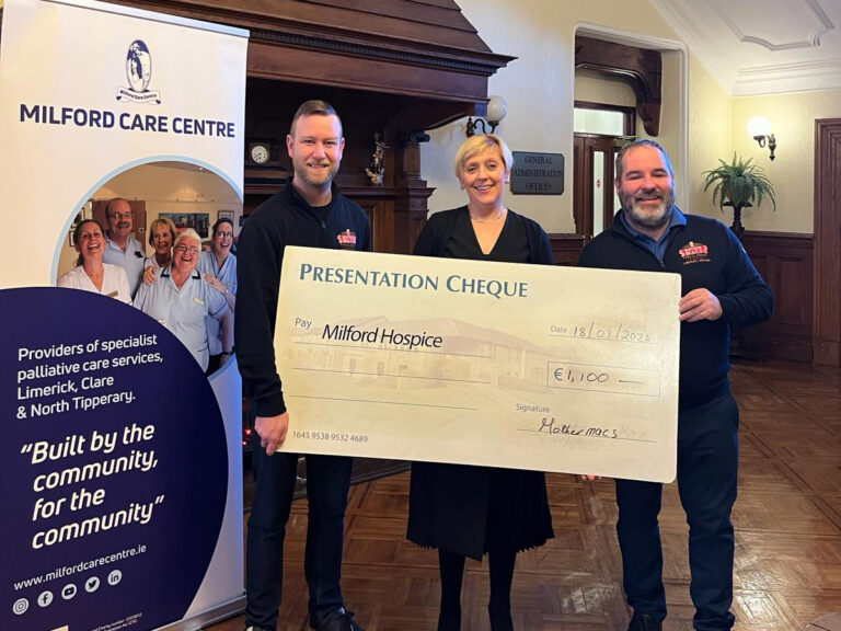 Raising glass and raising money on New Years Eve at Mother Macs