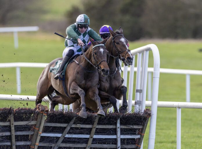 Aodhan May (left) on his way to winning for Ballingarry's Charles Byrnes and his son Philip at Navan at the weekend. Photo by Patrick McCann, acing Post