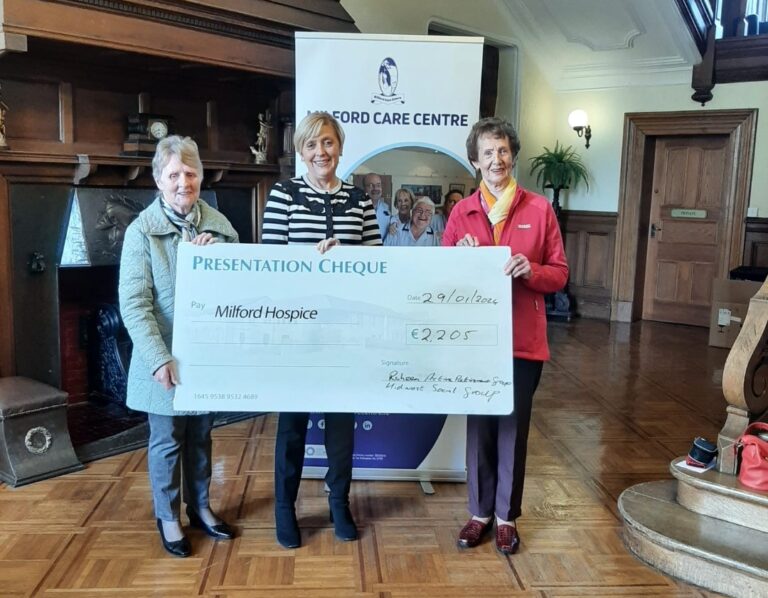 Two local groups make donation to Milford Care Centre after charity dance evening