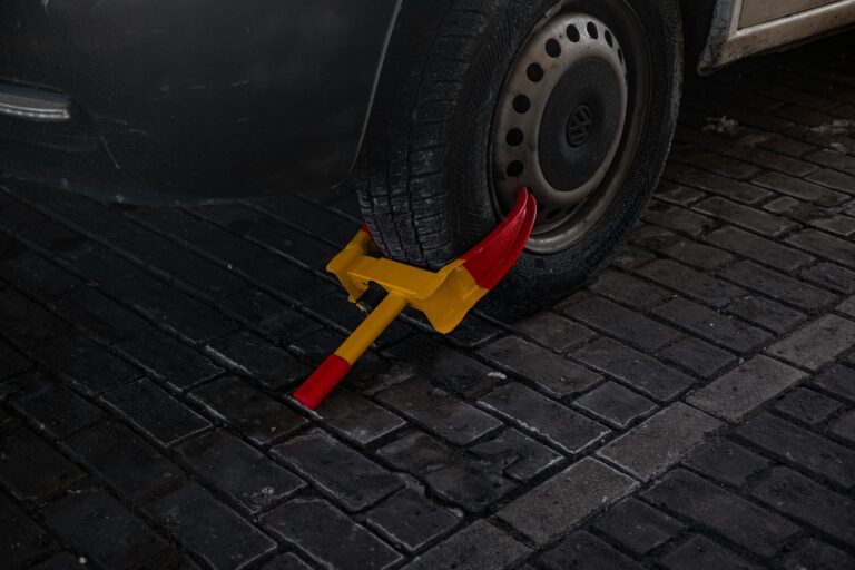 Lawlink – What can I do about management company wrongfully clamping my car while in designated space?