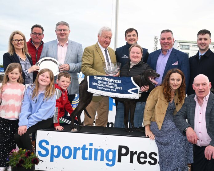 Pat Loughlin President ICC presents Aoife Coffey after Carrigmore Freya won 2025 Sporting Press Online Edition Irish Oaks Final