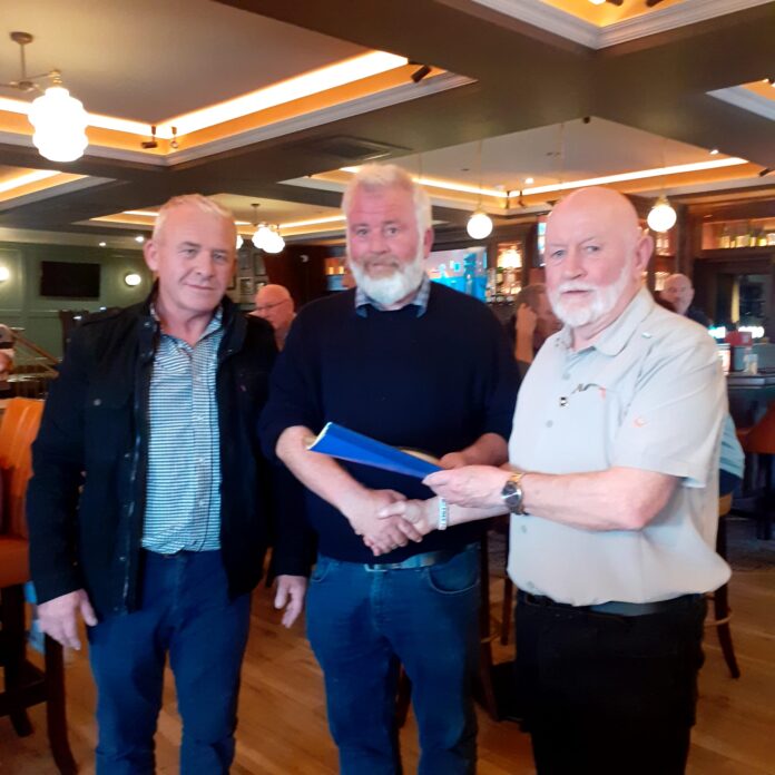 Tony Lowe and Michael McLoughlin of the Old Cratloe Road Residents Group presenting their petition to Michael Gibbons of ROD Engineers
