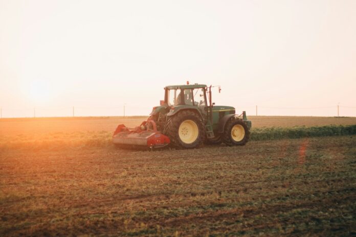 tractor farming ethereal-optics-zTY0RQgqb5g-unsplash