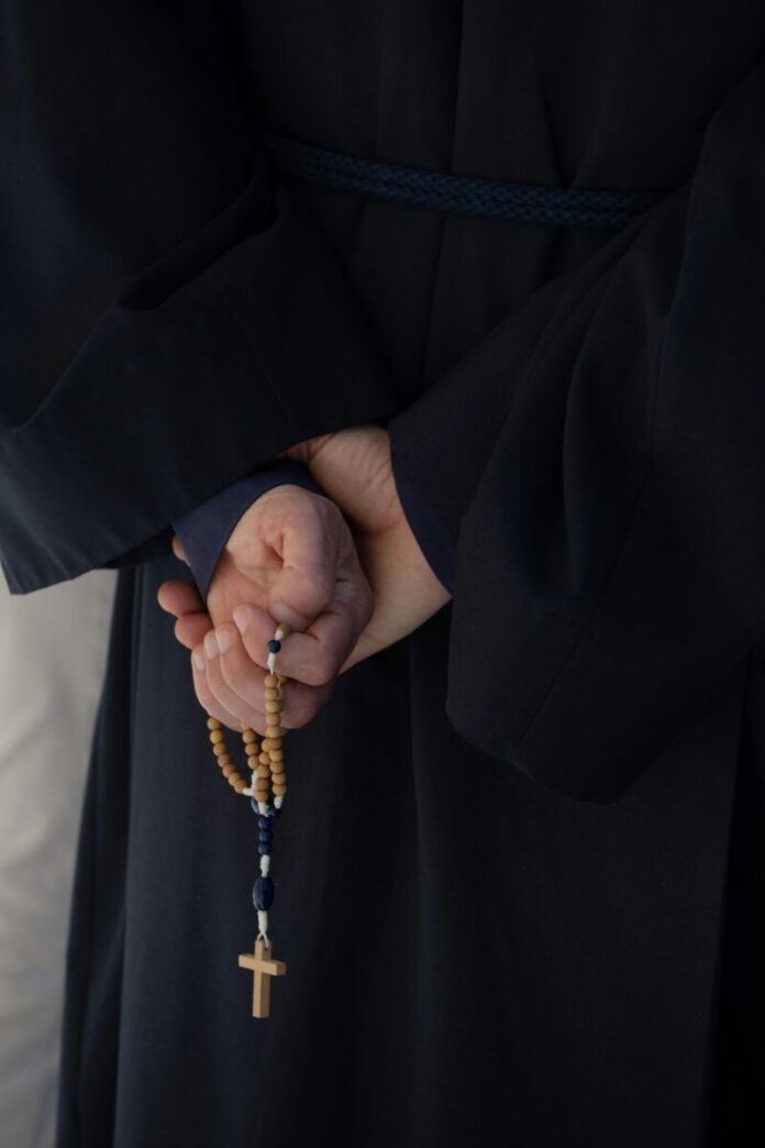 priest church religion catholic ben-michel-6OHt0-PGqco-unsplash